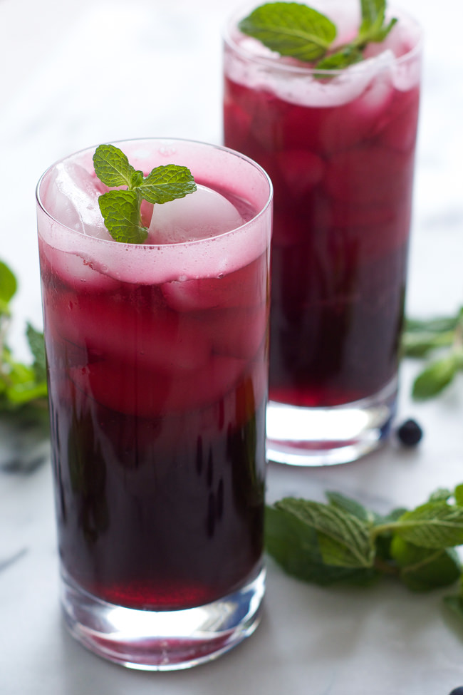 This Sparkling Blueberry Mojito Recipe is a fruity, summer staple that is easy enough to make for a crowd! 