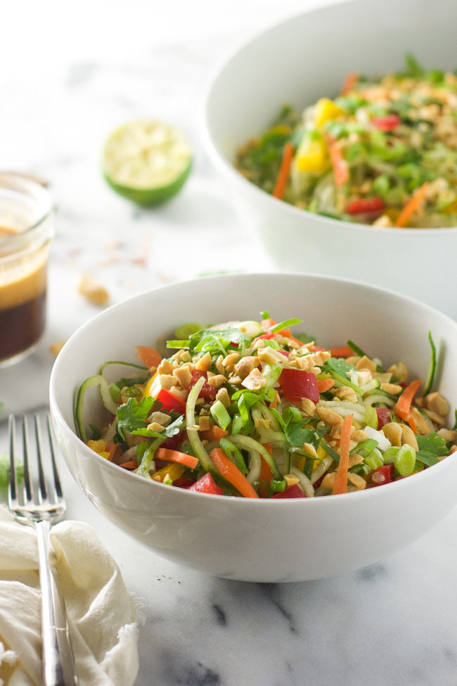 Thai Cucumber Salad Recipe with Peanut Chili Vinaigrette is a light and flavorful salad with a sweet and spicy dressing and loaded with vegetables!