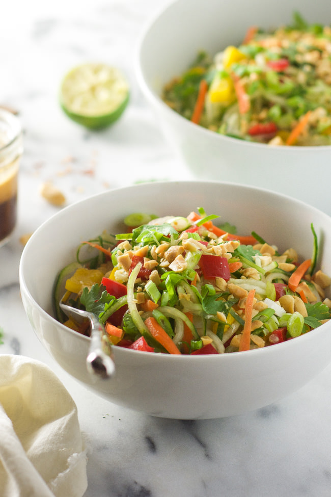 Thai Cucumber Salad Recipe with Peanut Chili Vinaigrette is a light and flavorful salad with a sweet and spicy dressing and loaded with vegetables!