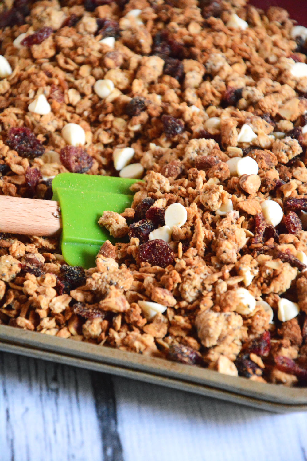 A naturally sweetened granola with tart cranberries and white chocolate morsels are the perfect snack or breakfast! 