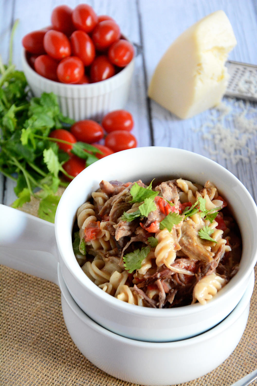 A creamy cajun alfredo sauce that comes together in minutes and topped with pulled pork is a quick and healthy dinner! #pasta #glutenfree #BBQ