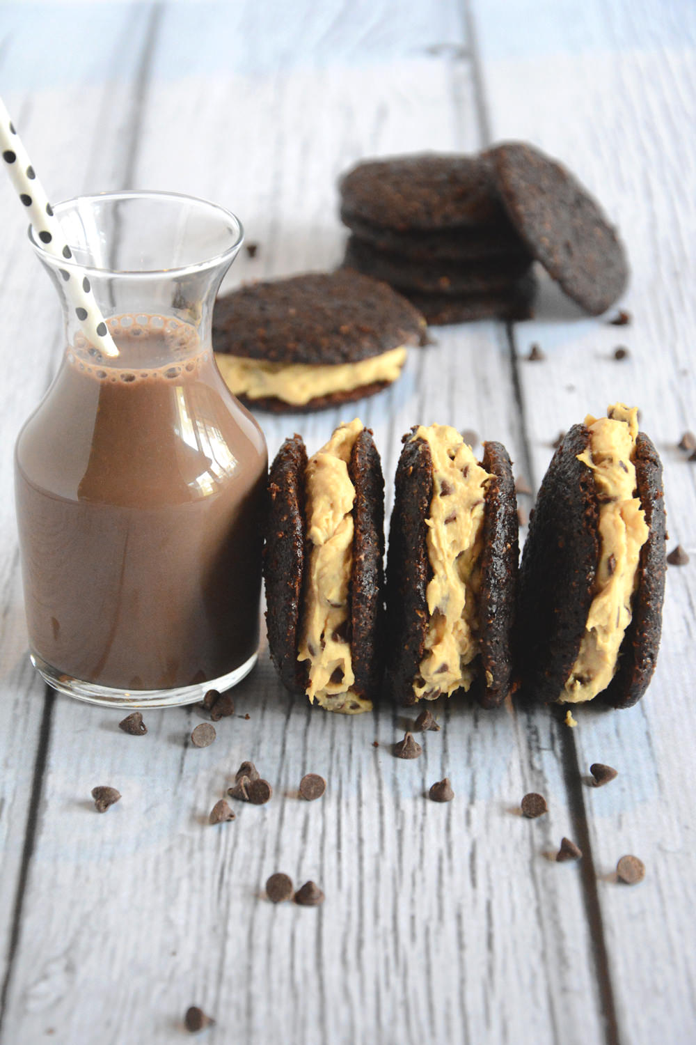 Cookie Dough Stuffed Whoopie Pies are a guiltless treat with a chocolate cookie and stuffed with cookie dough that only seems sinful!