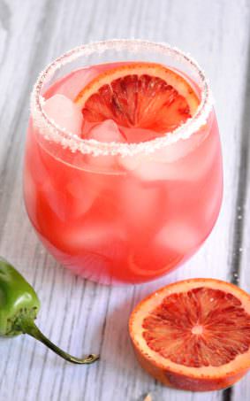 A refreshing twist on a classic margarita with fresh blood orange juice, triple sec and fresh squeezed lime juice!