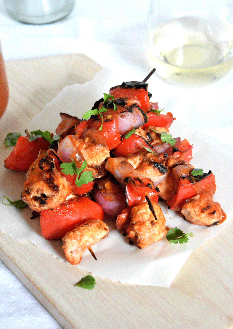 A spicy and sweet, from scratch BBQ sauce sweetened with mango packs a fiery punch and makes these chicken skewers irresistible!
