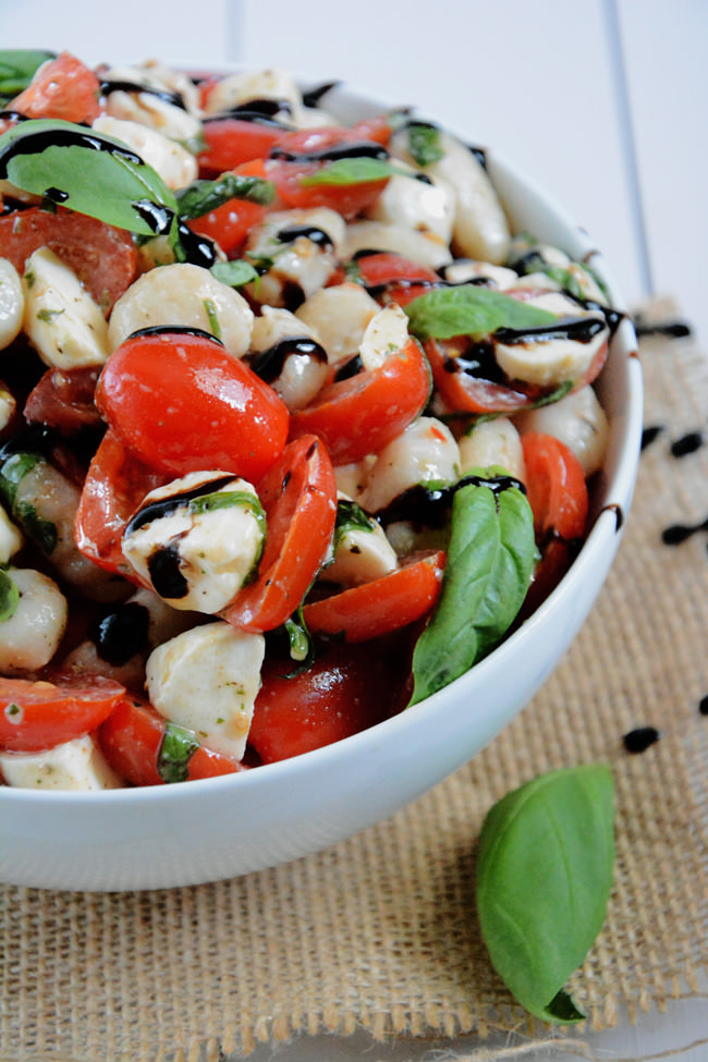 Caprese Salad gets made over and tossed with delicious gnocchi for an easy and wholesome, make ahead salad! #pastasalad #gnocchi #caprese #pasta