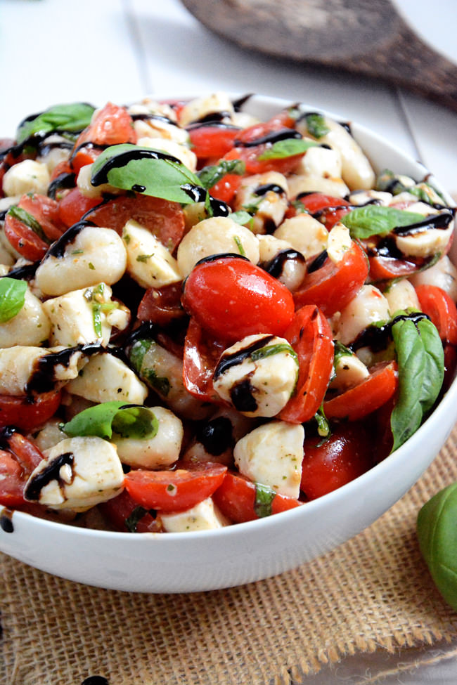 Caprese Salad gets made over and tossed with delicious gnocchi for an easy and wholesome, make ahead salad! #pastasalad #gnocchi #caprese #pasta