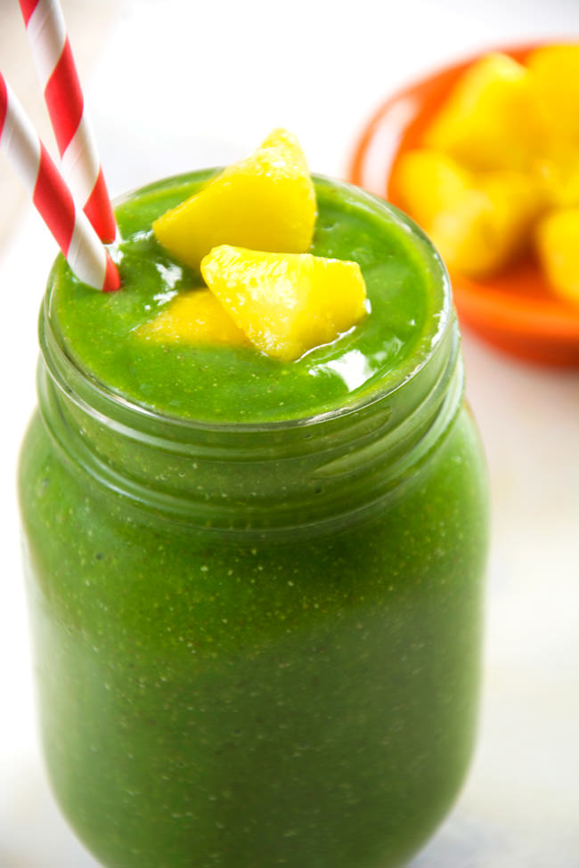 Cucumber Tropical Green Smoothie | Take a trip to the tropics with this tropical, green smoothie with hydrating cucumber, mango and fresh pineapple to help energize your day! #smoothie #tropical #healthy 