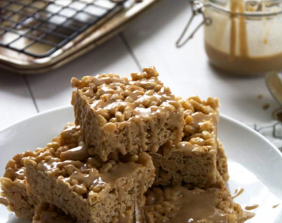 Irresistible, chewy rice krispies made with pumpkin pie spice and butterscotch then topped with a decedent French toast glaze! Buttery and toffee like treats that are perfect for fall!
