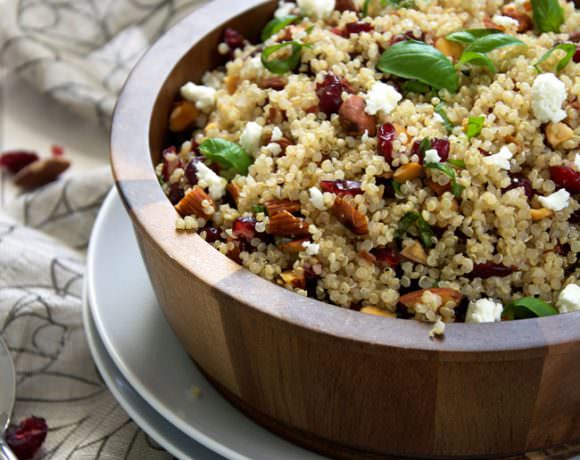 A simple, make ahead quinoa salad filled with tart cranberries, smoked almonds, basil, creamy goat cheese and finished off with a homemade balsamic vinaigrette! #quinoa #salad #glutenfree