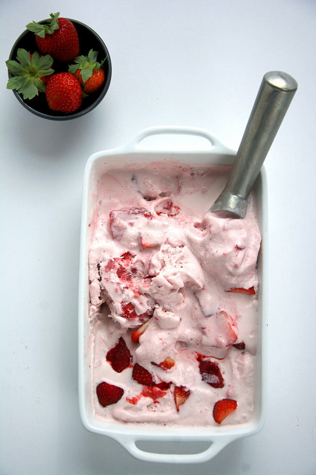 Creamy cheesecake ice cream made lighter with coconut and almond milk, and stuffed with caramelized, roasted strawberries for one heavenly frozen dessert!  #icecream # dessert #strawberries #cheesecake