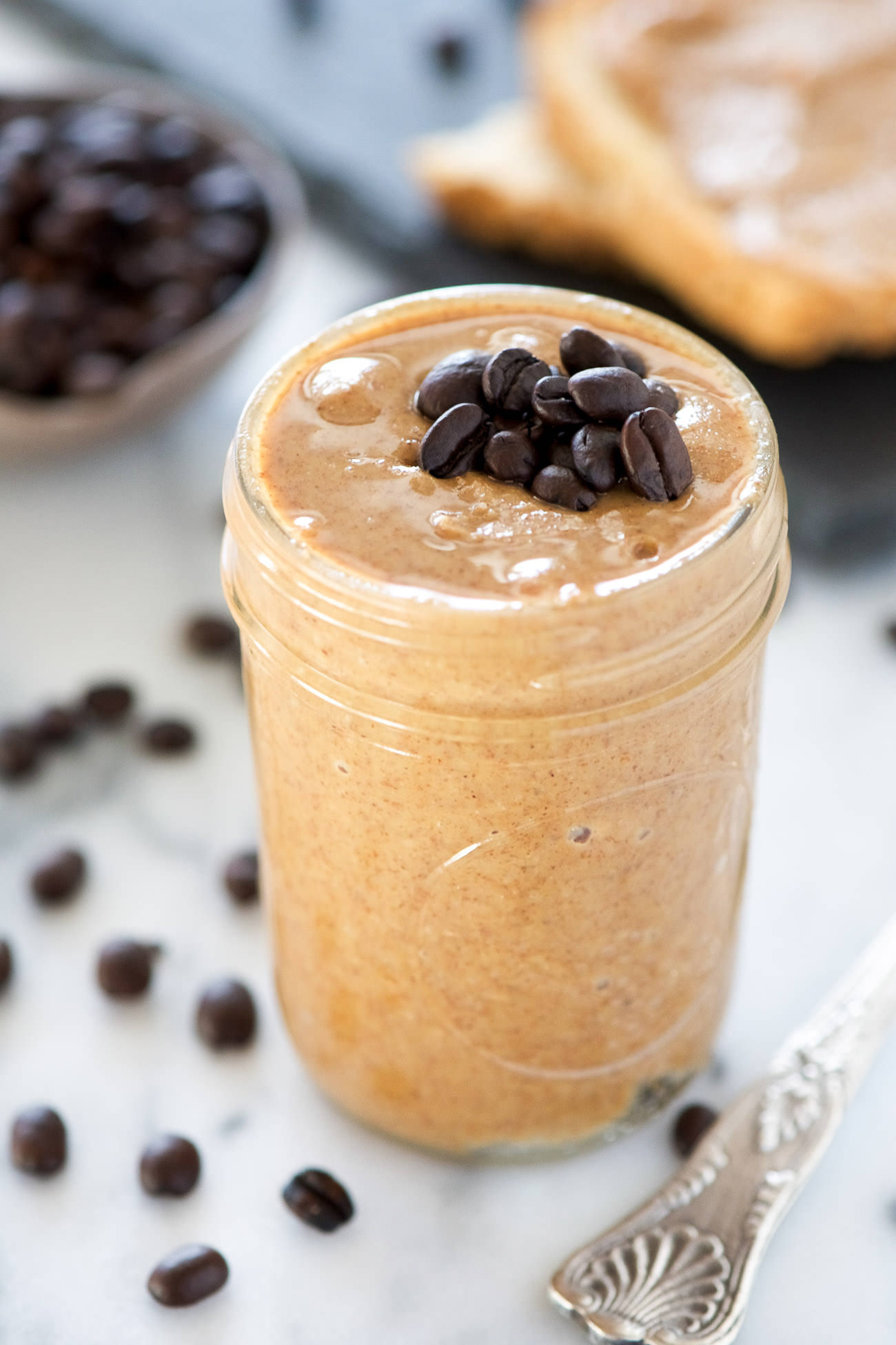 Vanilla Espresso Almond Butter is a homemade version of a store bought favorite! Roasted almonds mixed with vanilla beans and espresso for an energy charged almond butter!