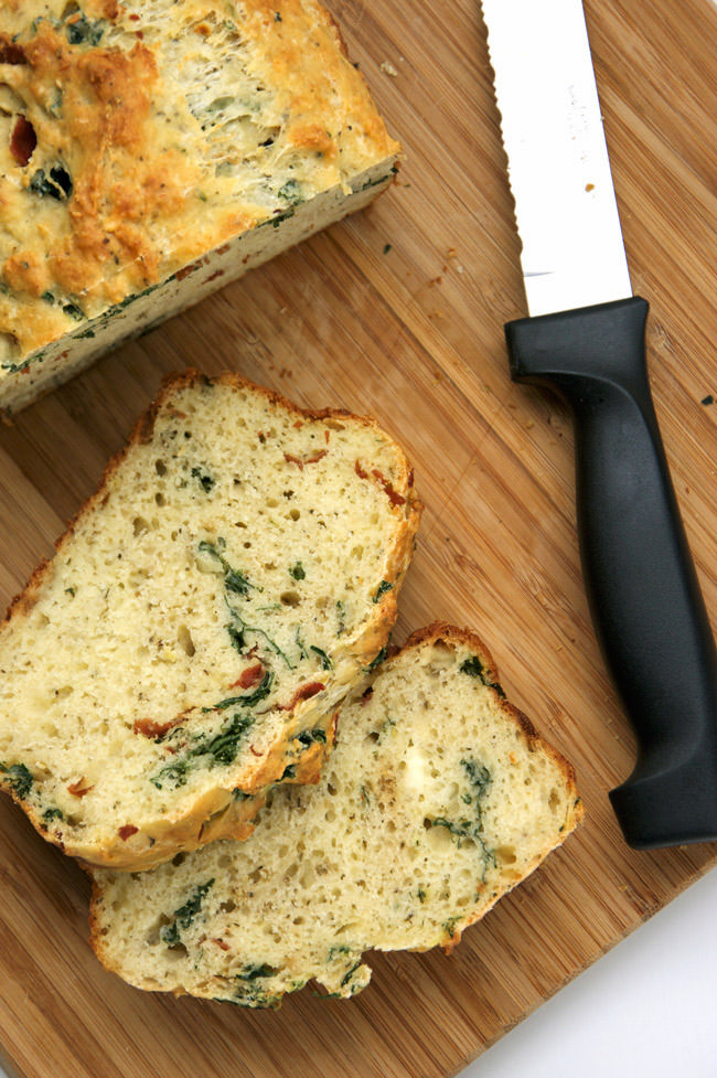 A lighter, savory parmesan bread with buttery prosciutto and fresh kale. The perfect cheesy bread that is perfect for the holiday season and compliments any dinner!