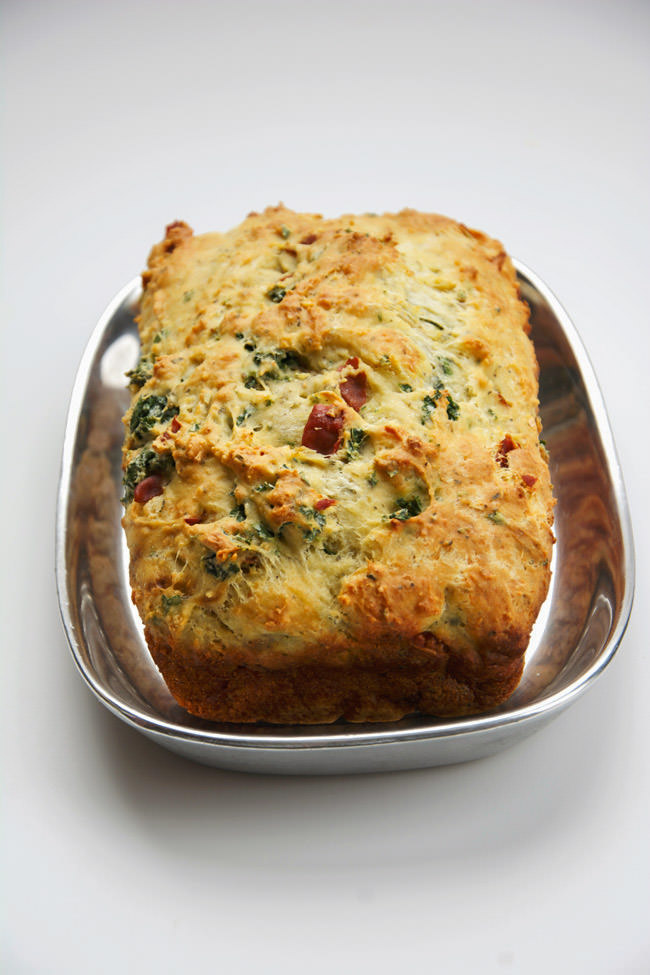 A lighter, savory parmesan bread with buttery prosciutto and fresh kale. The perfect cheesy bread that is perfect for the holiday season and compliments any dinner!