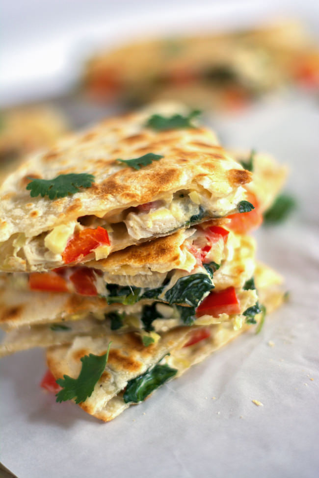 These Smoked Gouda & Turkey Artichoke Quesadillas come together quickly using leftover turkey, two types of cheese, red peppers and artichokes! They are a delicious and easy appetizer or light dinner! #healthy #leftovers #turkey #quesadilla