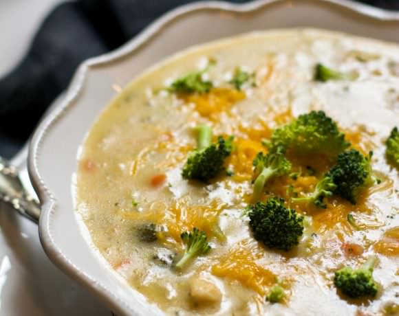 A Panera classic made over for a creamy yet lighter Chicken Broccoli Cheddar Soup! You won't miss the heavy cream and butter in this delicious recipe!