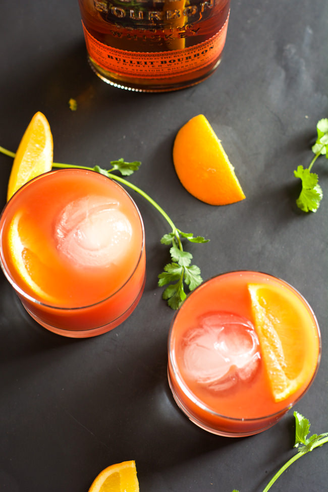 This Blood Orange Bourbon Sunrise is a sweet and sour cocktail that is spiced with smooth bourbon, fresh blood orange juice and a touch of honey! #cocktail #drink #bourbon #whiskey