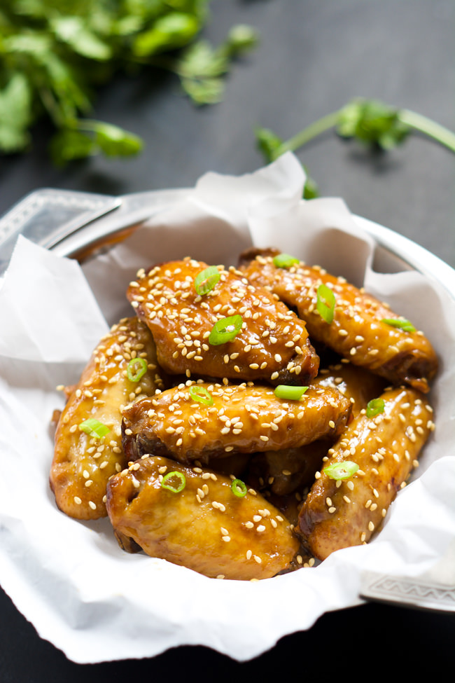 Forget the fryer with these Slow Cooker Garlic Honey Teriyaki Chicken Wings! Filled with Asian flavors of garlic, honey, ginger and soy sauce, these wings are the perfect appetizer or light dinner! 