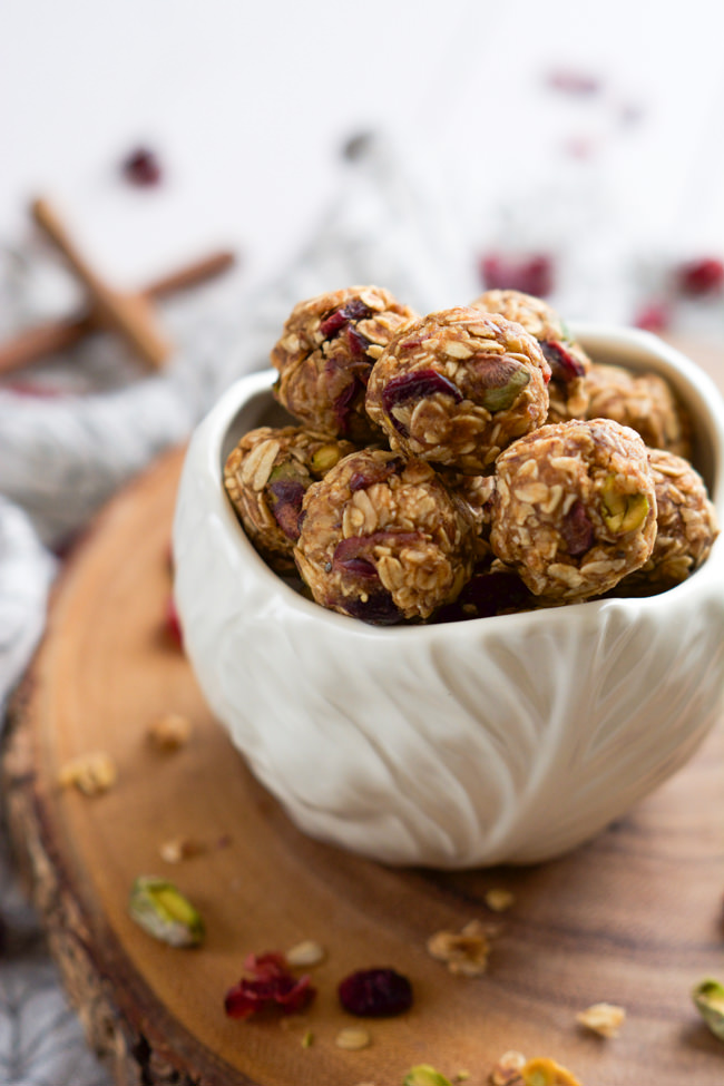 Quick and healthy no bake Fruit and Nut Trail Mix Energy Balls are loaded with dried cranberries, oats and pistachios for a nutritious breakfast or snack on the go! #energyballs #glutenfree #snacks #healthy
