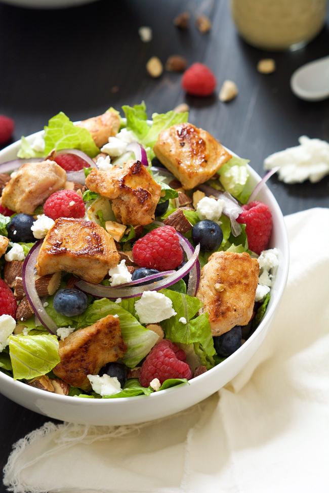 A hearty Chicken Salad with Peanut Dijon Dressing that is filled with fruit, creamy goat cheese, smoked almonds that is a nutritious dinner or lunch! #glutenfree #salad #fruit #peanutdjiondressing
