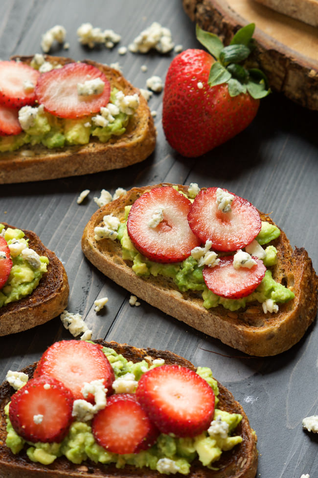 A simple, no fess appetizer that is sweet, savory and salty! Strawberry Avocado Toast with blue cheese crumbles is healthy and indulgent all in one bite and takes minutes to make!