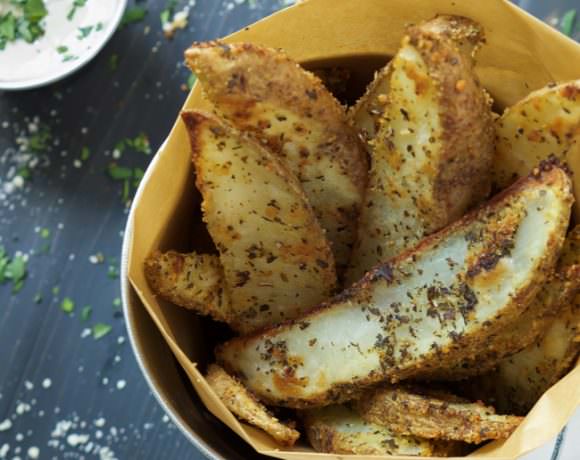 Amazingly crispy and creamy all in one bite! Crispy Parmesan Fries have a crunchy exterior and a buttery interior and pair perfect with the roasted garlic aioli!