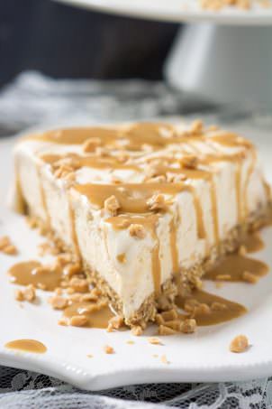 The perfect summer make ahead dessert; Skinny Toffee Caramel Ice Cream Cake has a no bake Oatmeal Cookie Crust that is a match made in heaven!