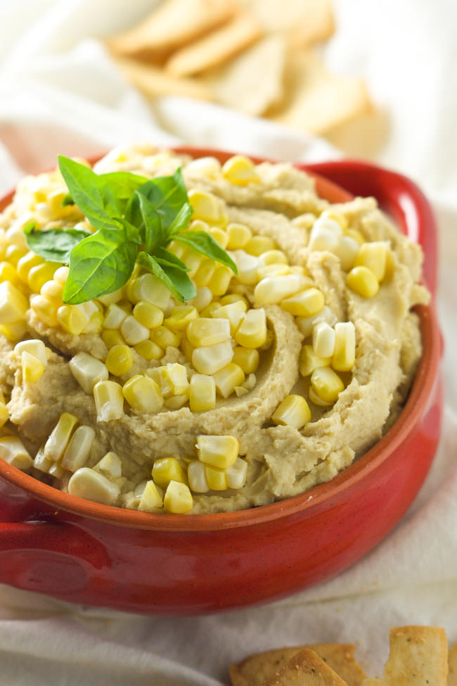 This Sweet Corn & Basil Hummus is filled with summer flavors and only takes 5 minutes to prepare! 