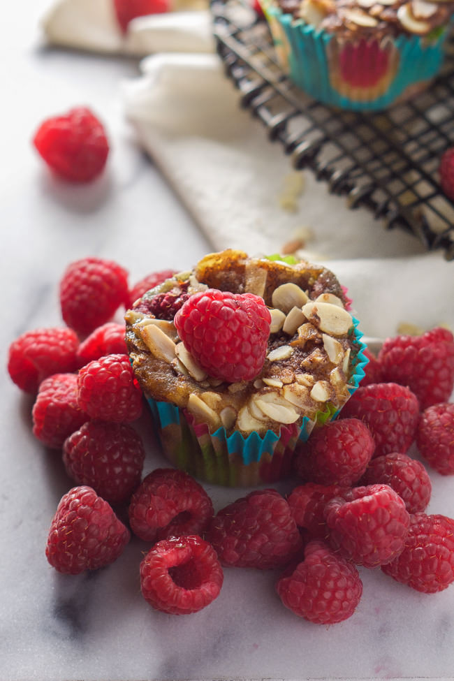 Sweet and tender, these Skinny Raspberry Coffee Cake Muffins with Almond Streusel are secretly healthy and bursting with flavor! Something worth getting up for each morning!
