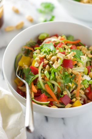 Thai Cucumber Salad with Peanut Chili Vinaigrette is a light and flavorful salad with a sweet and spicy dressing and loaded with vegetables!