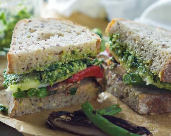 A sandwich that is full of flavor! Farmers Market Roasted Vegetable Sandwich with Skinny Pesto is loaded with fresh vegetables creamy provolone and layered with a healthy pesto sauce!
