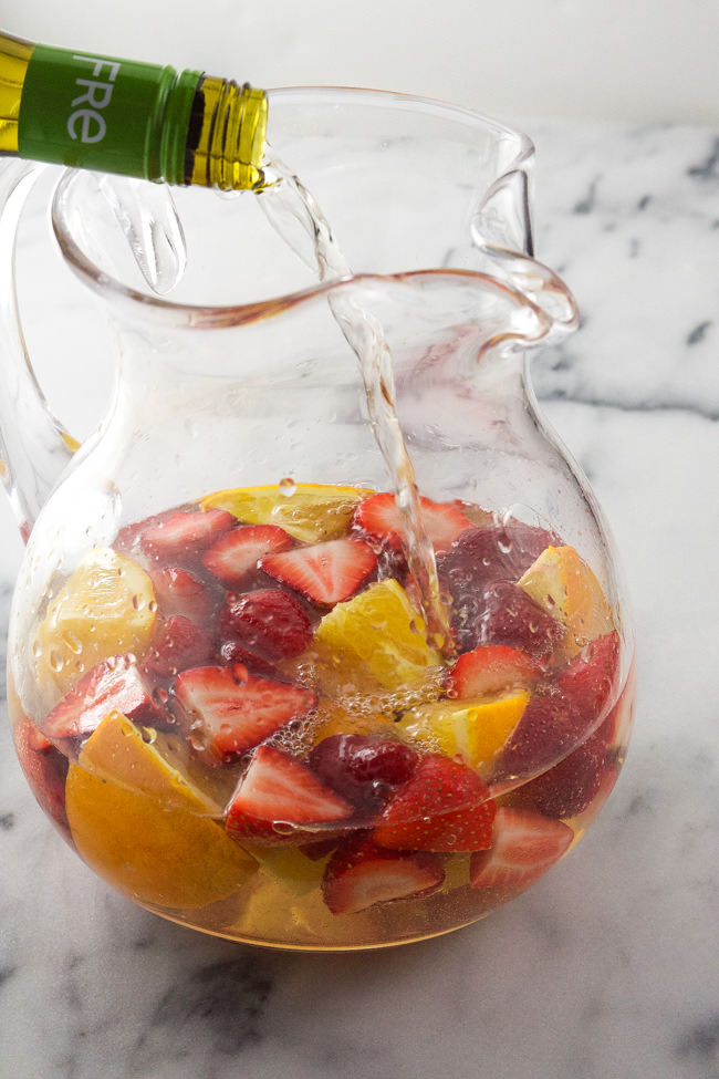Sparkling White Strawberry Sangria is a refreshing, bubbly sangria loaded with tons of fresh strawberries and a crisp white wine! 