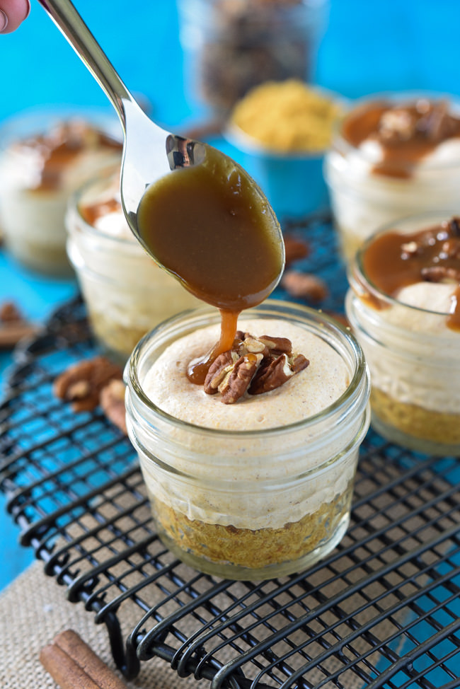 No Bake Pumpkin Cheesecake is a creamy pumpkin flavored mousse over sweetened graham cracker crust and finished with a nutty, caramel drizzle!
