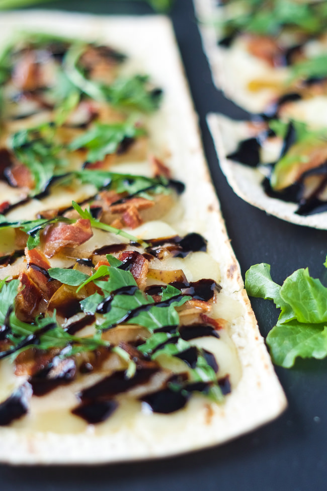 Pear, Brie and Bacon Flatbread are a simple dinner filled with sweet, salty and savory flavors that can be on your table in 15 minutes!
