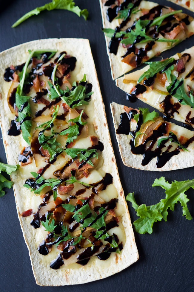 Pear, Brie and Bacon Flatbread are a simple dinner filled with sweet, salty and savory flavors that can be on your table in 15 minutes!