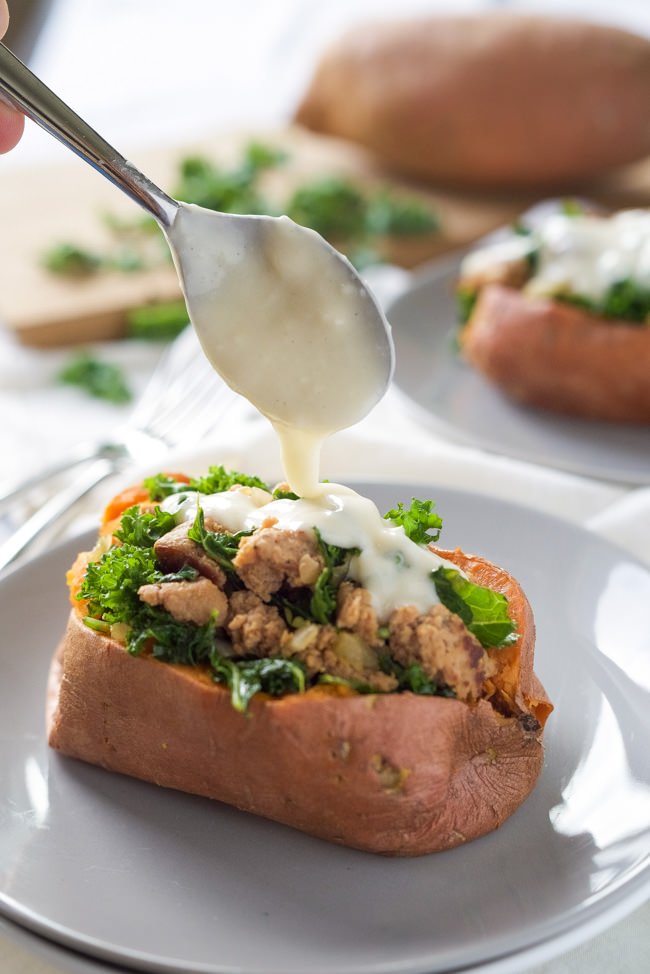 Kale and Sausage Stuffed Sweet Potatoes with White Cheese Sauce-4