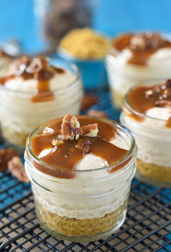 No Bake Pumpkin Cheesecakes are a creamy pumpkin flavored mousse over sweetened graham cracker crust and finished with a nutty, caramel drizzle!
