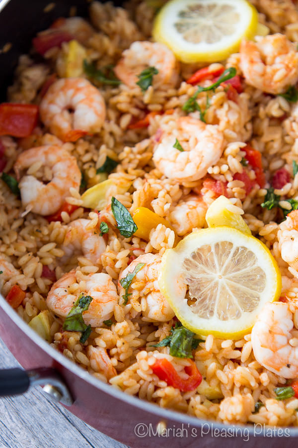 This One Pot Shrimp and Veggie Orzo is the perfect weeknight meal. Lots of crisp veggies, succulent shrimp, fresh basil and a secret spice make this meal a favorite in our family!