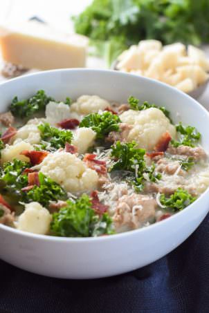 A healthy spin on a restaurant classic, this Skinny Zuppa Toscana Soup is lightened up with cauliflower and sweet turkey sausage! And not mention, it's brought together in 30 minutes!