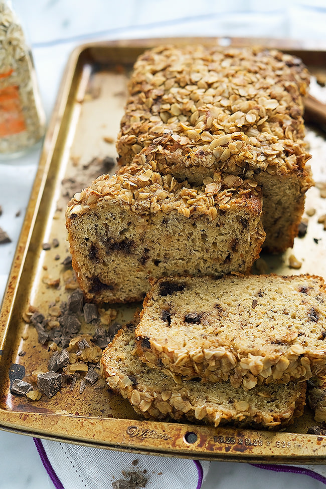Dark Chocolate Chunk Banana Bread with Oatmeal Streusel is tender, sweet, filled with dark chocolate chunks and a crunchy, irresistible streusel topping!