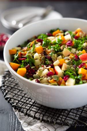 This Fall Harvest Salad is full of fall flavors; roasted butternut squash, tender wild rice, pepitas, sweet apples, and hearty kale. And finish the salad with a seasonal Apple Cider Vinaigrette! A dish that is perfect to make ahead!