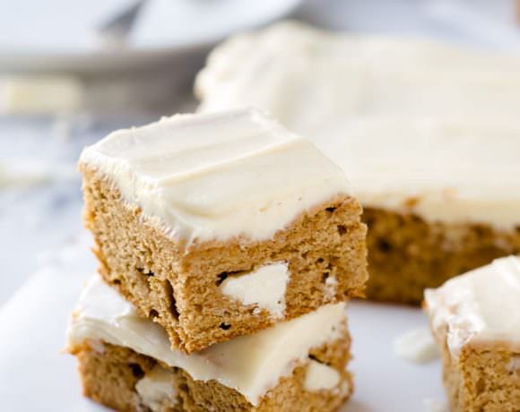 Pumpkin Spice White Chocolate Blondies are super chewy, loaded with white chocolate and topped with an irresistible brown butter maple frosting!