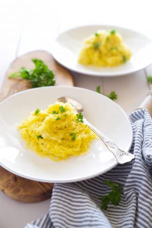 Garlic Brown Butter Spaghetti Squash is quick and healthy side dish that is super cheesy and tossed in nutty garlicky browned butter! One bite and you won't believe how light it really is!