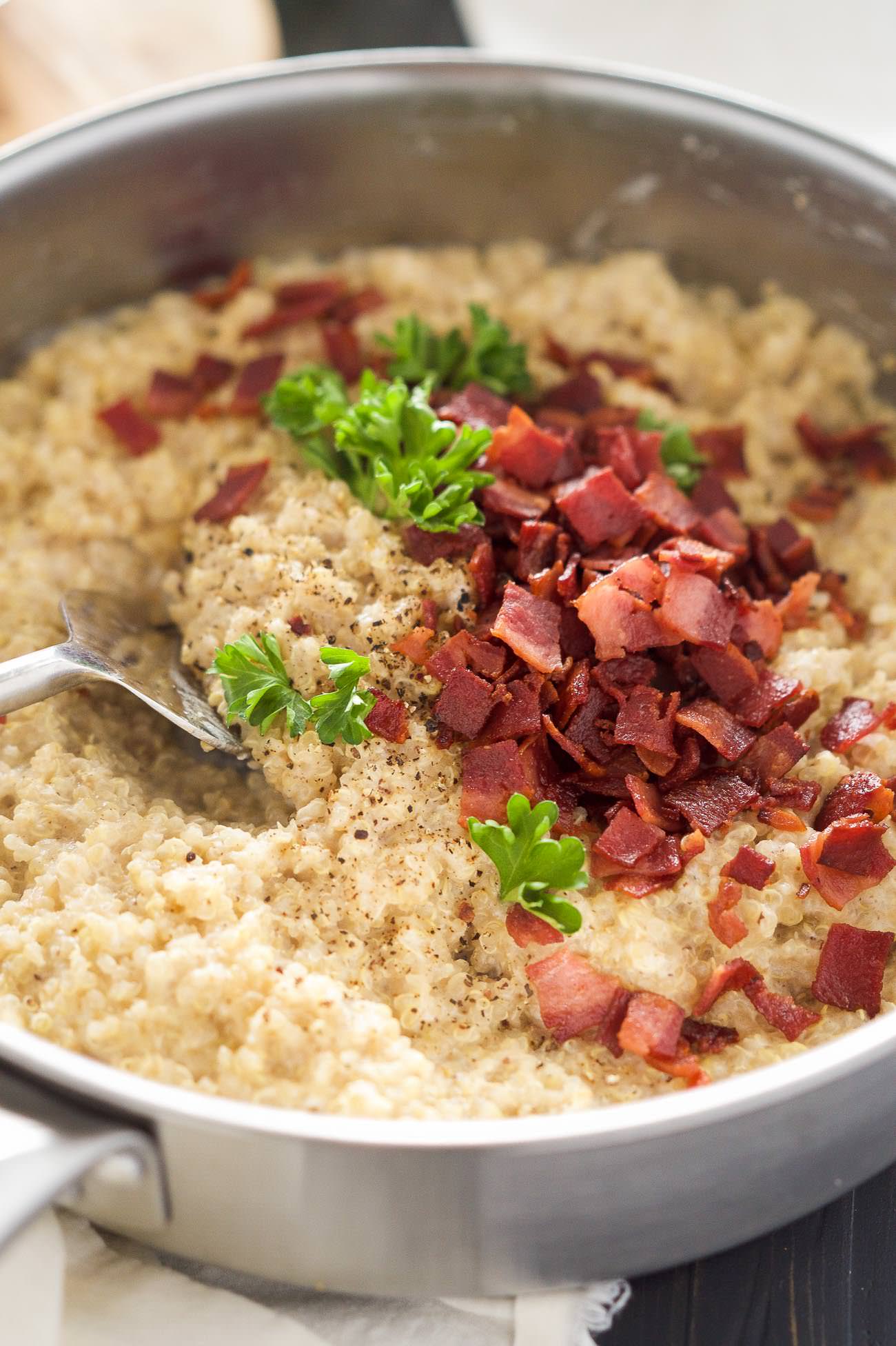 Goat Cheese & Bacon Quinoa Risotto is a shortcut version of the classic risotto! Creamy goat cheese, bacon and quinoa come together in under 30 minutes and requires minimal hands on time; making this the perfect healthy, side dish!