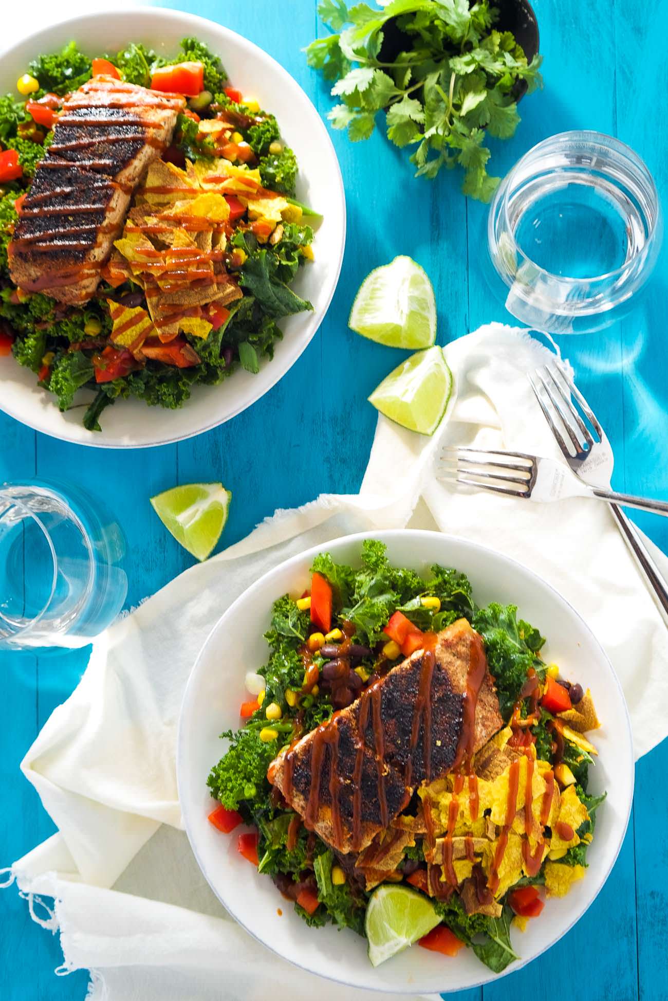 BBQ Salmon Kale Salad is a healthy and updated version of the classic BBQ salad! Filled with bold flavors, crunchy kale, crispy vegetables and all toss in a Honey Chipotle Vinaigrette! One easy to prepare salad you will fall in love with!