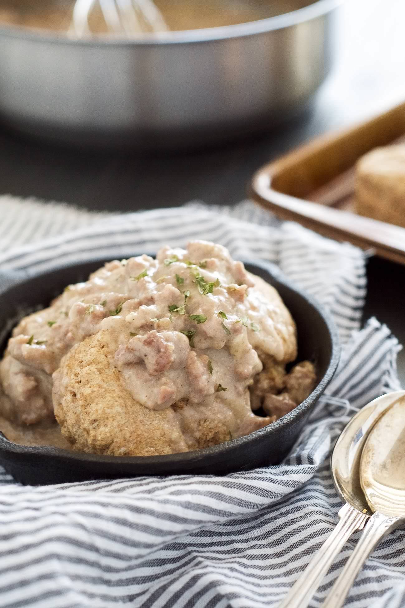 Skinny Biscuits and Gravy with Maple Sausage Gravy is a brunch favorite that has been lightened up with whole wheat biscuits, turkey sausage and a touch of maple in gravy!