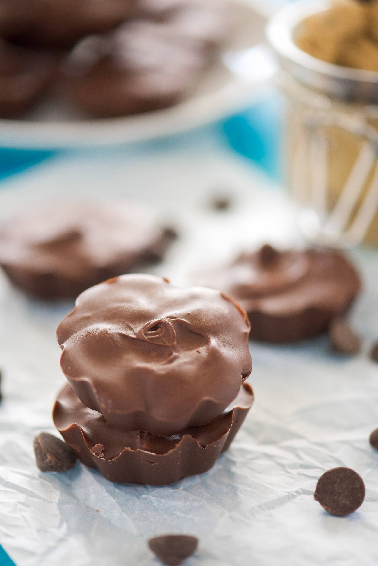 Healthy Cookie Dough Peanut Butter Cups are an upgraded, homemade peanut butter cups! Stuffed with skinny peanut butter cookie dough, these cups are perfect for holidays or to beat that sweet tooth!