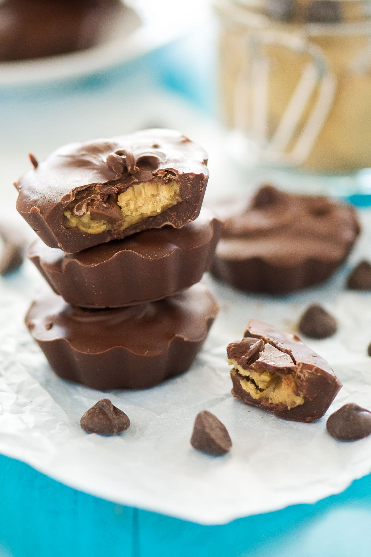 Healthy Cookie Dough Peanut Butter Cups are an upgraded, homemade peanut butter cups! Stuffed with skinny peanut butter cookie dough, these cups are perfect for holidays or to beat that sweet tooth!
