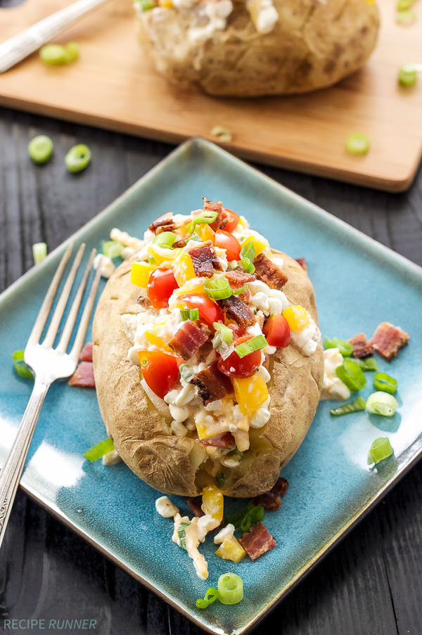 These Healthy Loaded Baked Potatoes swap out the butter and sour cream and replace it with cottage cheese and vegetables, for a delicious, easy, and healthy lunch!