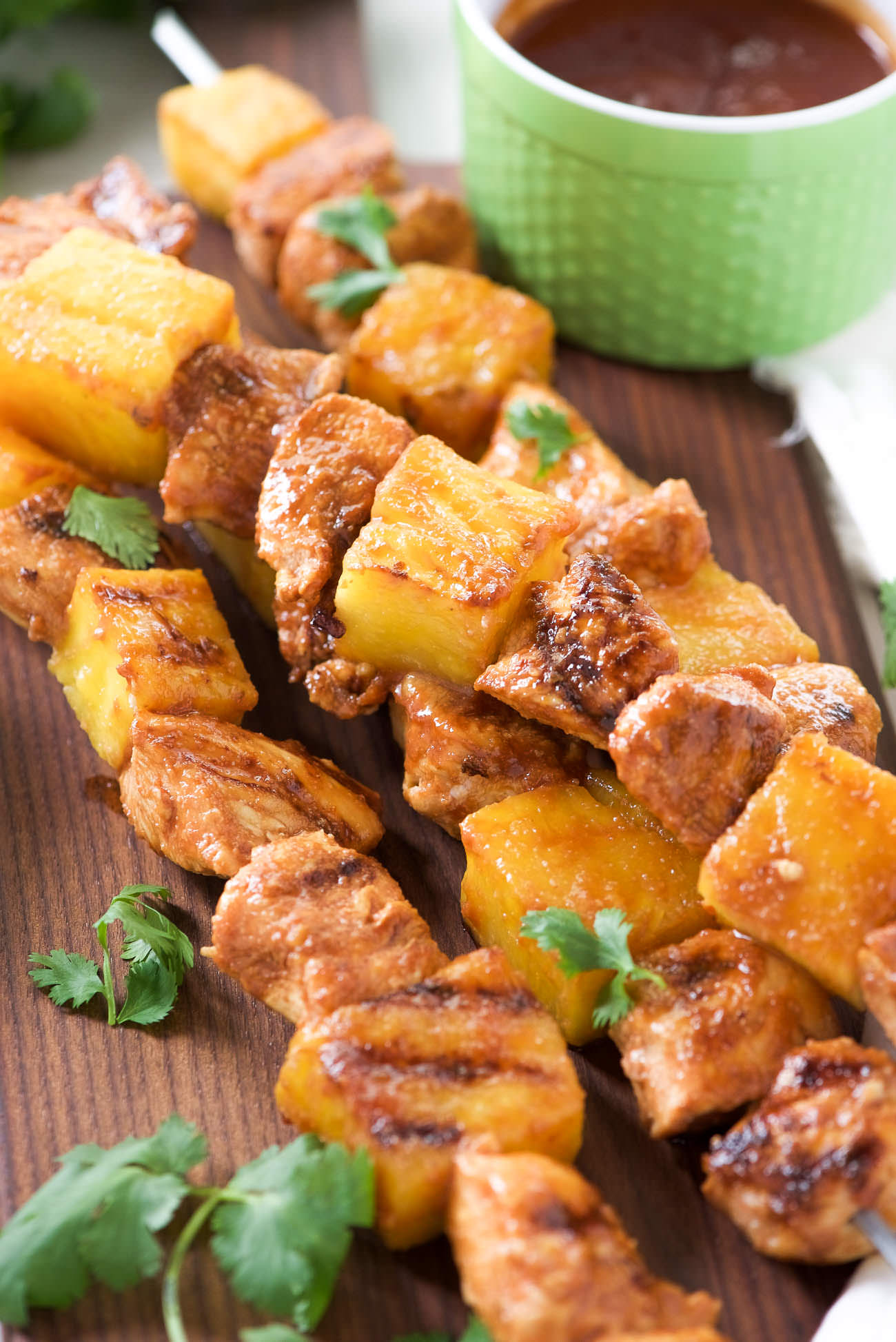 Grilled Huli Huli Chicken Kabobs - Juicy pineapple and tender chicken coated in a sweet and savory glaze then grilled to perfection! The perfect summertime, quick dinner!