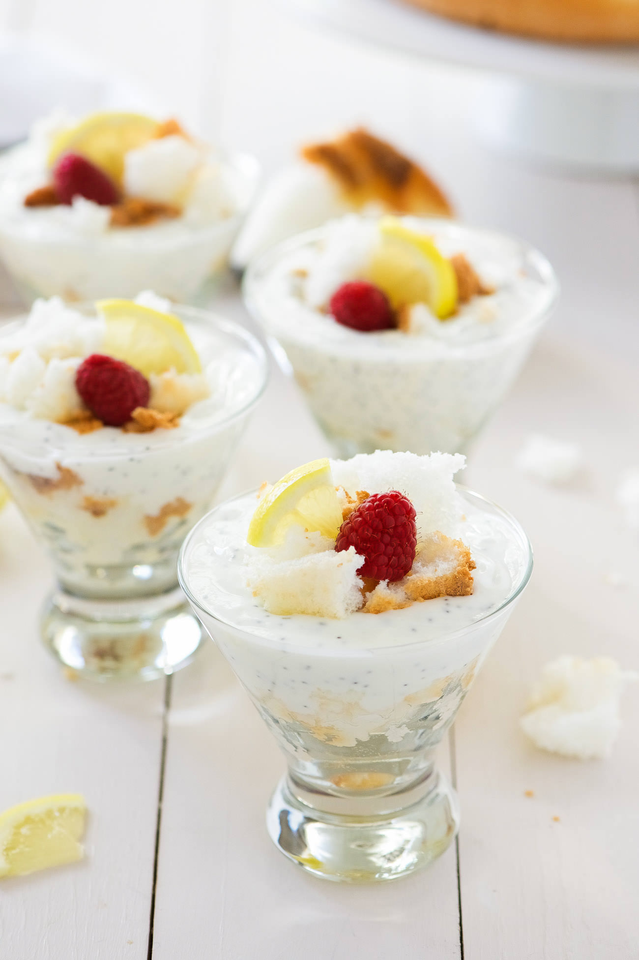 Lemon Poppy Seed Angel Food Trifles are the perfect light dessert! A quick treat with a lemon poppy seed yogurt and sweet, angel food cake crumbles!